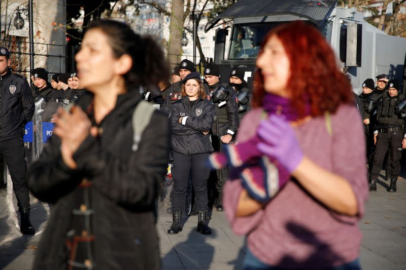 Women perform the Chilean anti-rape song during a demonstration against gender violence in Istanbul,