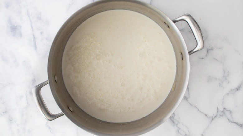 cream mixture simmering in pot