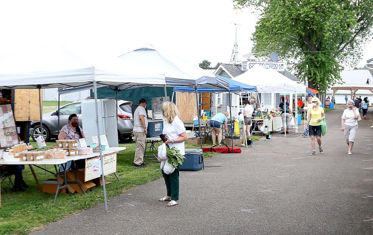 Masks and social distancing were the norm as the Tuscarawas Valley Farmers Market opened the 2020 season.