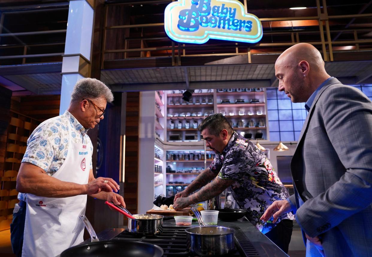 Warren Coleman (left), formerly of Neptune, is shown with judges Aarón Sánchez (center) and Joe Bastianich during an episode of "MasterChef."