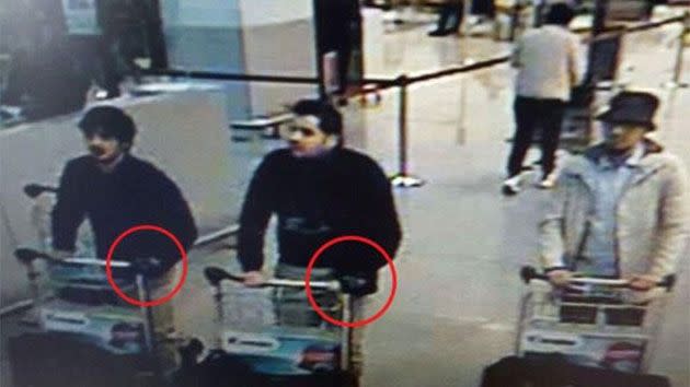 Just moments before Brussels airport bomber Ibrahim El Bakraoui (centre) detonated a deadly explosive package, he dumped a major clue into a nearby bin. Photo: Getty Images