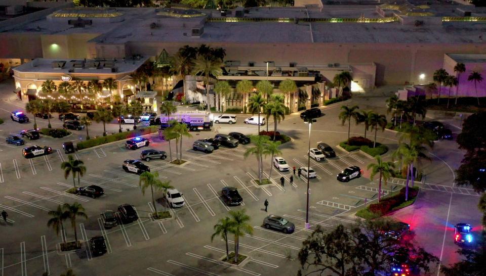 Police continue their investigation of an afternoon at the Gardens Mall after a shooting there on February 14, 2024, in Palm Beach Gardens, Florida.