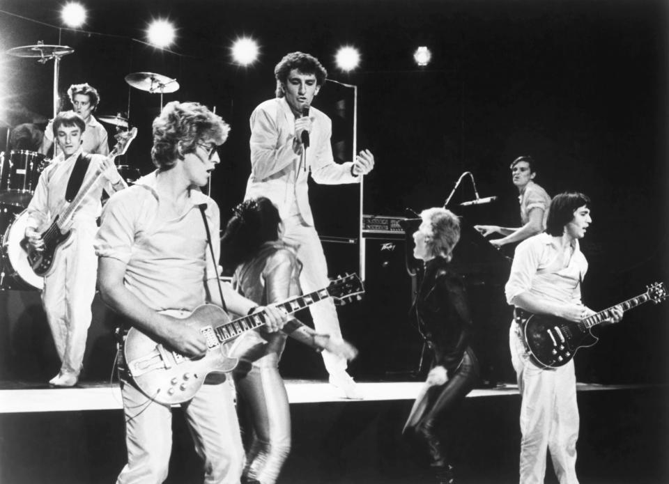 The Tubes, with Anderson at far left, perform with Olivia Newton-John in ‘Xanadu’, 1980 (Everett Collection)