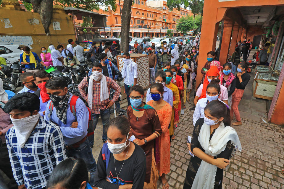 Students Crowd Outside An Examination Centre In Jaipur