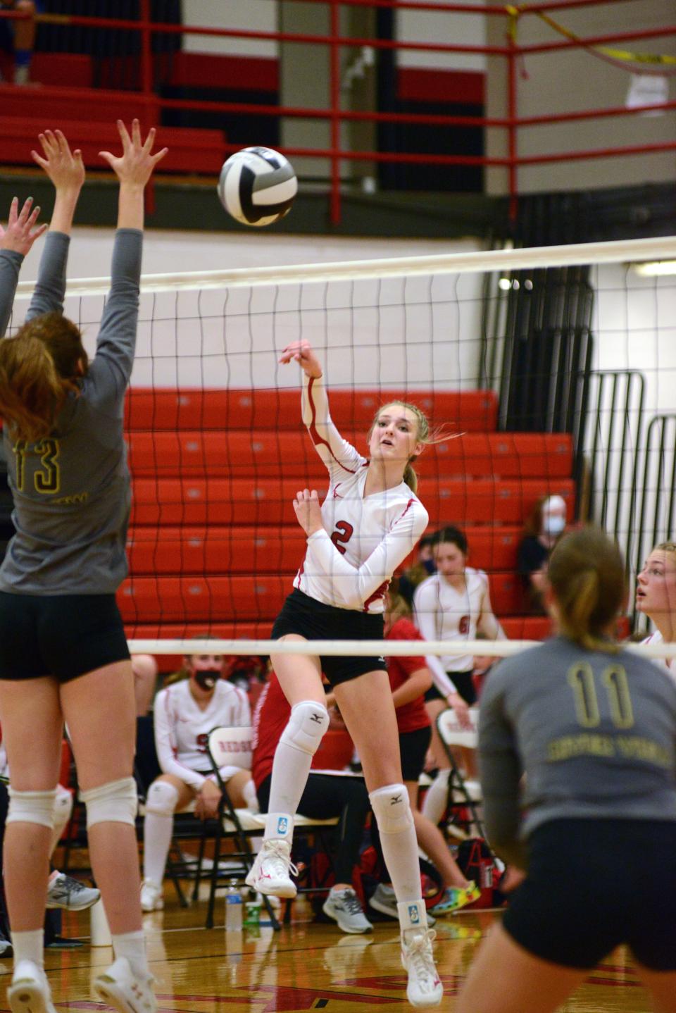 Lindsay Bryant, of Coshocton, spikes the ball against River View in a match earlier this season. Bryant will continue her volleyball career at Muskingum University.