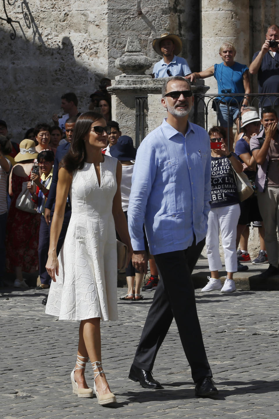 Spain's King Felipe VI and Queen Letizia walk in Old Havana, Cuba, Tuesday, Nov. 12, 2019. (Jorge Luis Baños/Pool Photo via AP)