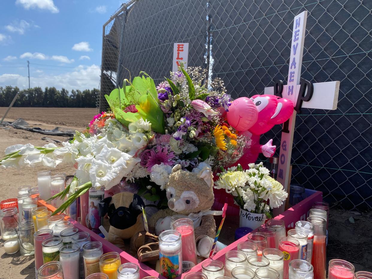 A roadside memorial in June 2020 marks the site on Pleasant Valley Road where Nevaeh Gomez, 7, and her grandmother Elva Andrade, 55, were killed when their scooter was hit head-on. The driver was convicted Tuesday of two counts of second-degree murder.