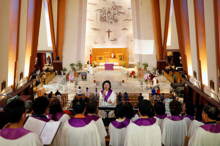 A choir sings during Mass at a Catholic church in Taipei, Taiwan March 11, 2018. REUTERS/Tyrone Siu