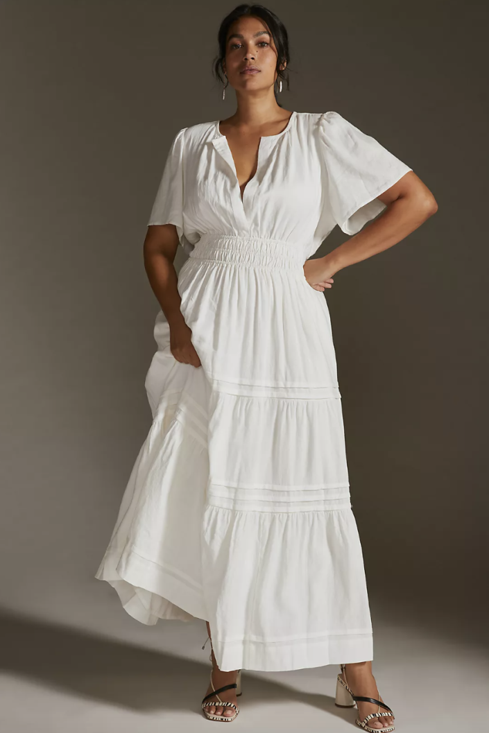 plus size model in white maxi dress, The Somerset Maxi Dress: Linen Edition in White (Photo via Anthropologie)