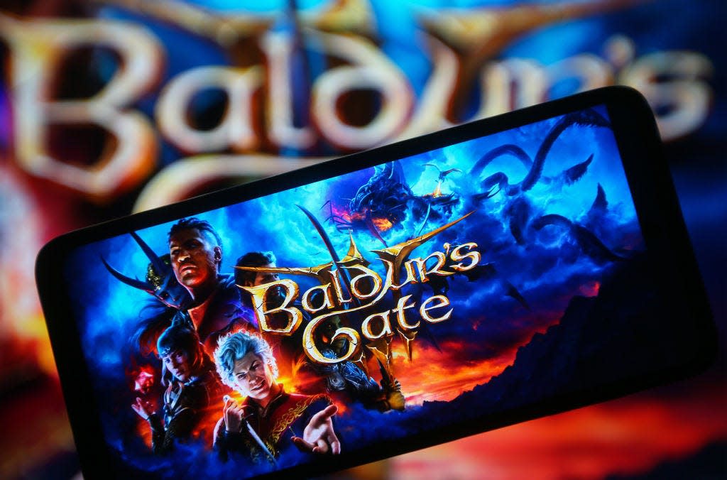 Baldur's Gate 3 logo on a smartphone screen.