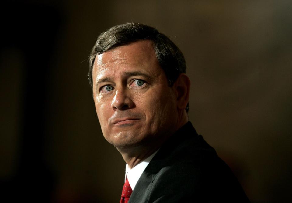 Supreme Court nominee John G. Roberts glances around the Caucus Room of the Senate's Russell office building during his confirmation hearing on Capitol Hill in Washington, Monday, Sept. 12, 2005.