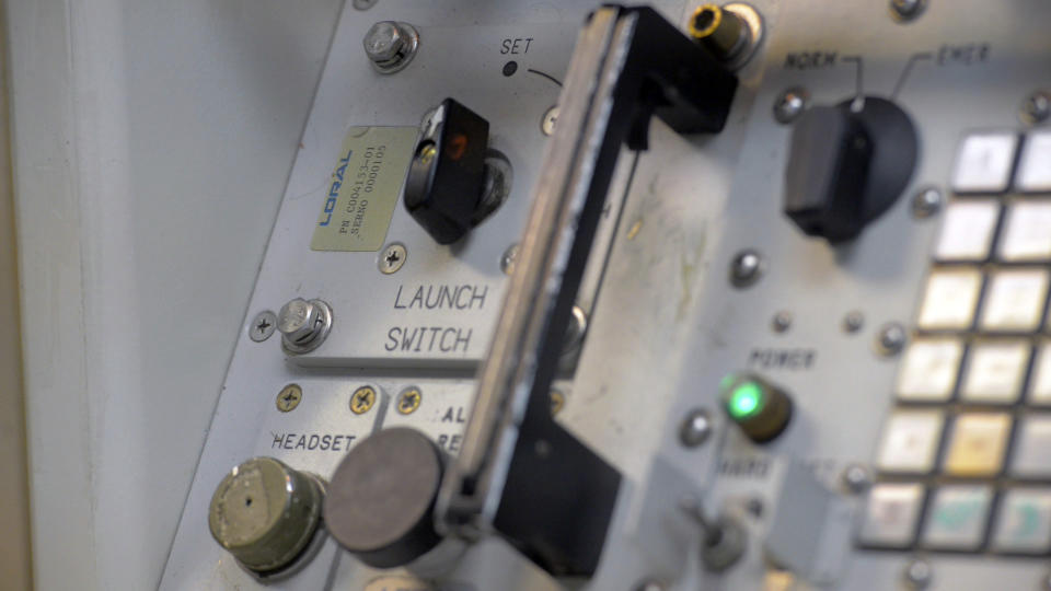 In this Oct. 19, 2018, photo provided by the U.S. Air Force, one of the multiple launch switches sits in the upper-left portion of a panel at a missile alert facility launch control center operated by the 320th Missile Squadron at F.E. Warren Air Force Base, Wyo. The control panel that would be used in case of a silo-based nuclear missile launch is still very much reflective of the 1960s and 1980s technology it still relies on. It will all be overhauled with the arrival of the new Sentinel system, but some caution that it’s dependence on old technology is what keeps it protected from cyber warfare. (Staff Sgt. Neal Uranga/U.S. Air Force via AP)