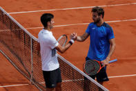 Tennis - French Open - Roland Garros, Paris, France - 29/5/17 Serbia's Novak Djokovic shakes the hand of Spain's Marcel Granollers as he celebrates winning his first round match Reuters / Gonzalo Fuentes