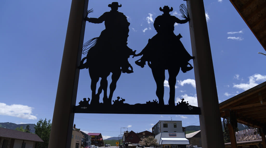 pedestrian walks through Gardiner, Montana