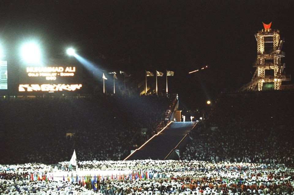 General view of the Oympic Stadium during the Opening Ceremony as Muhammad Ali of the USA lights the Olympic Flame to start the 1996 Centennial Olympic Games in Atlanta, Georgia.