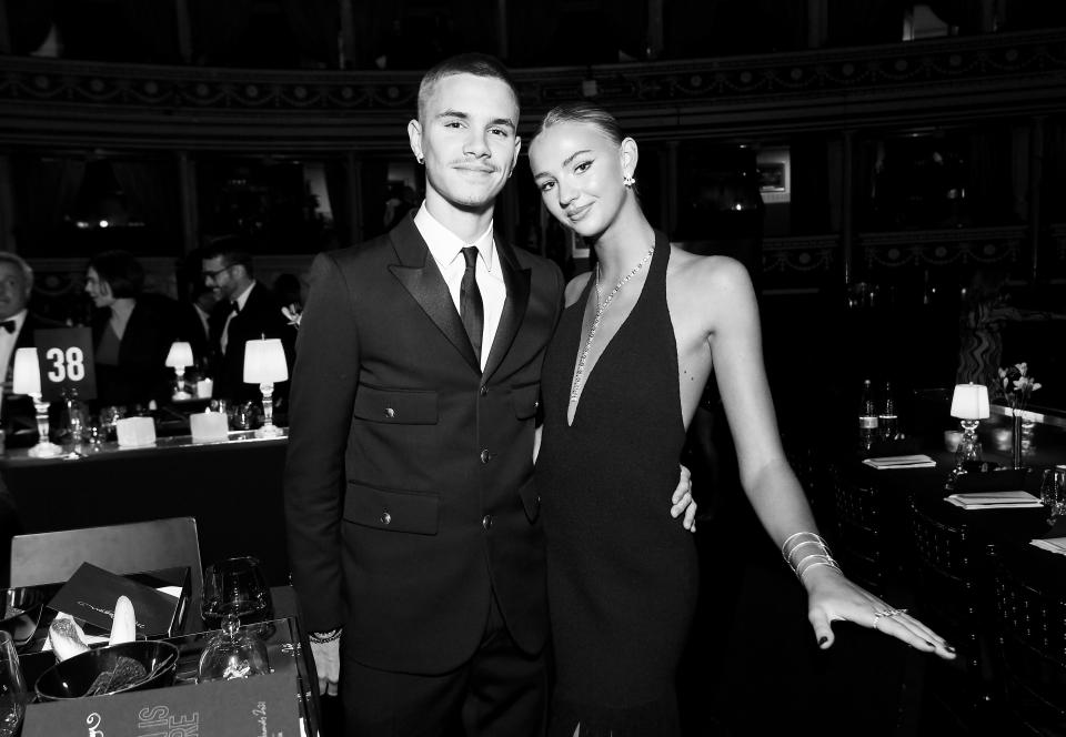 LONDON, ENGLAND - NOVEMBER 29: (EDITORS NOTE: This image has been converted to black and white.) Romeo Beckham and Mia Regan attend The Fashion Awards 2021 at the Royal Albert Hall on November 29, 2021 in London, England. (Photo by Jeff Spicer/BFC/Getty Images for BFC)