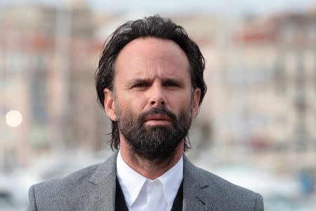 Actor Walton Goggins poses during a photocall for the television series "Six" during the annual MIPCOM television programme market in Cannes, France, October 17, 2016. REUTERS/Eric Gaillard