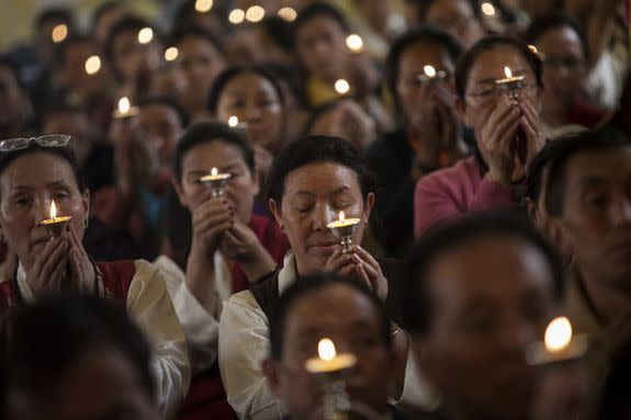 People attend a prayer service in New York City for Sherpa victims of the April 18, 2014, avalanche on Mt. Everest.