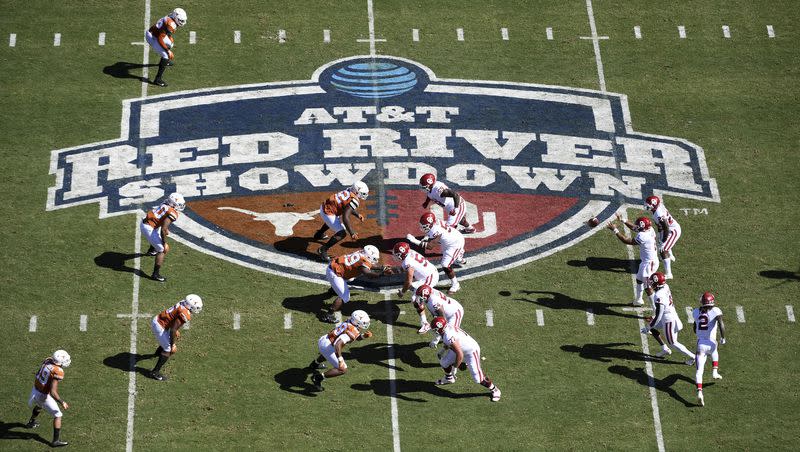 Oklahoma, right, runs a play against Texas at the Cotton Bowl on Oct. 12, 2019, in Dallas. The final Big 12 version of the Red River Showdown takes place Saturday.