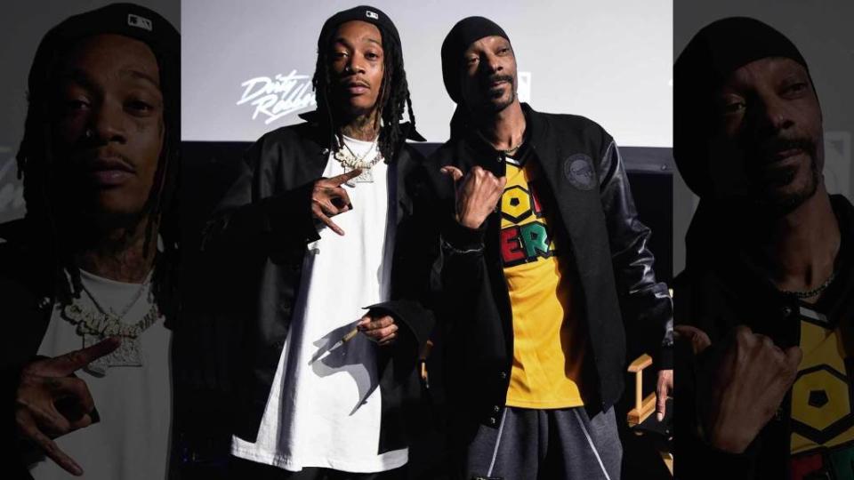 <p>Snoop Dogg helped celebrate Wiz Khalifa‘s Apple documentary with a big ol’ blunt. The legendary rapper joined Wiz onstage Tuesday during a premiere for his “Behind The Cam” documentary in Inglewood. The 5-part series interviews Wiz’s famous friends and family members about his rise to stardom after releasing the hit “Black and Yellow.” Amber Rose‘s […]</p> <p>The post <a rel="nofollow noopener" href="https://theblast.com/wiz-khalifa-snoop-dogg-apple-documentary/" target="_blank" data-ylk="slk:Wiz Khalifa Lights Up With Snoop Dogg For ‘Behind The Cam’ Premiere;elm:context_link;itc:0;sec:content-canvas" class="link ">Wiz Khalifa Lights Up With Snoop Dogg For ‘Behind The Cam’ Premiere</a> appeared first on <a rel="nofollow noopener" href="https://theblast.com" target="_blank" data-ylk="slk:The Blast;elm:context_link;itc:0;sec:content-canvas" class="link ">The Blast</a>.</p>