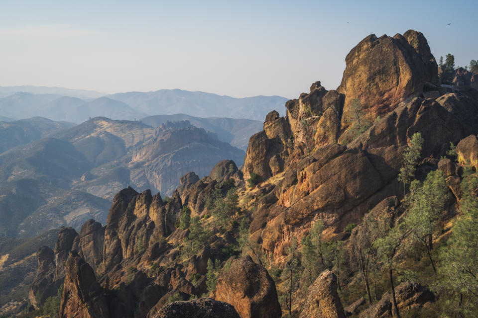 Rocky spires and trees in a mountainous landscape