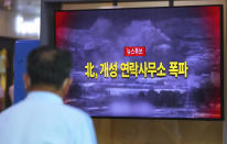 A man watches a TV screen showing a news program about the demolition of the inter-Korean liaison office building, at the Seoul Railway Station in Seoul, South Korea, Tuesday, June 16, 2020. North Korea blew up an inter-Korean liaison office building just north of the heavily armed border with South Korea on Tuesday in a dramatic display of anger that sharply raises tensions on the Korean Peninsula and puts pressure on Washington and Seoul amid deadlocked nuclear diplomacy. The letters read "North Korea, demolition of the inter-Korean liaison office building in Kaesong." (Kim Do-hun/Yonhap via AP)