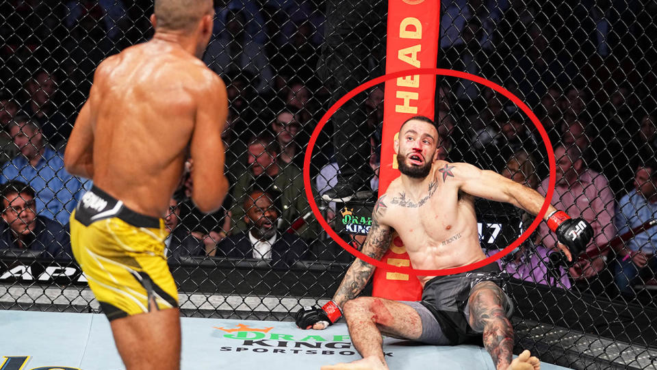 Edson Barboza (pictured left) chasing Shane Burgos (pictured right) after a bizarre delayed reaction from the defeated fighter.