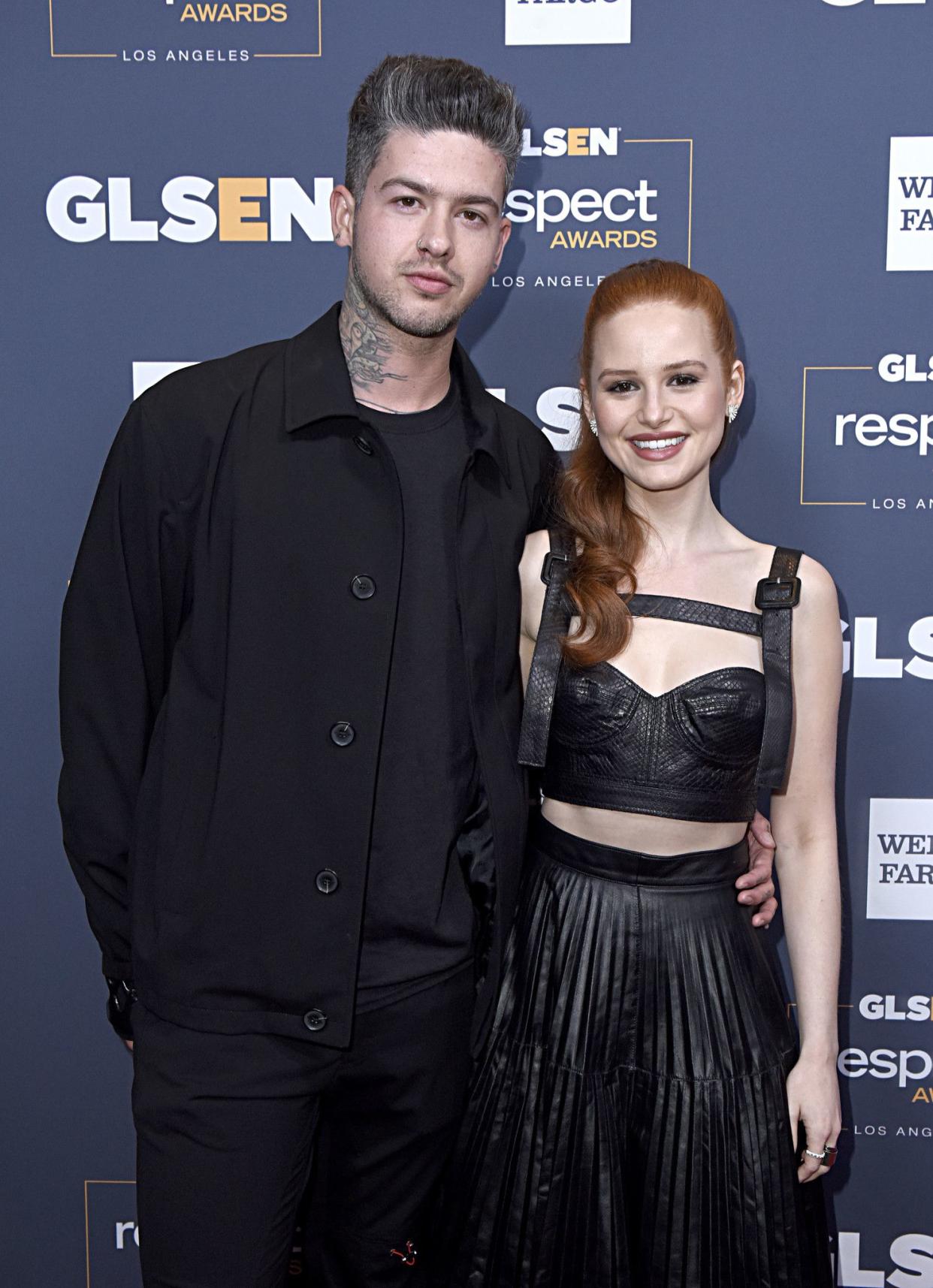 “Riverdale” star Madelaine Petsch (R) and Travis Mills, her boyfriend of three years, are officially over. Multiple outlets confirmed the split on Feb. 19, 2020 and Petsch has reportedly moved out of his Los Angeles apartment. The two, who began dating in 2017, hadn’t been photographed together since December 2019.