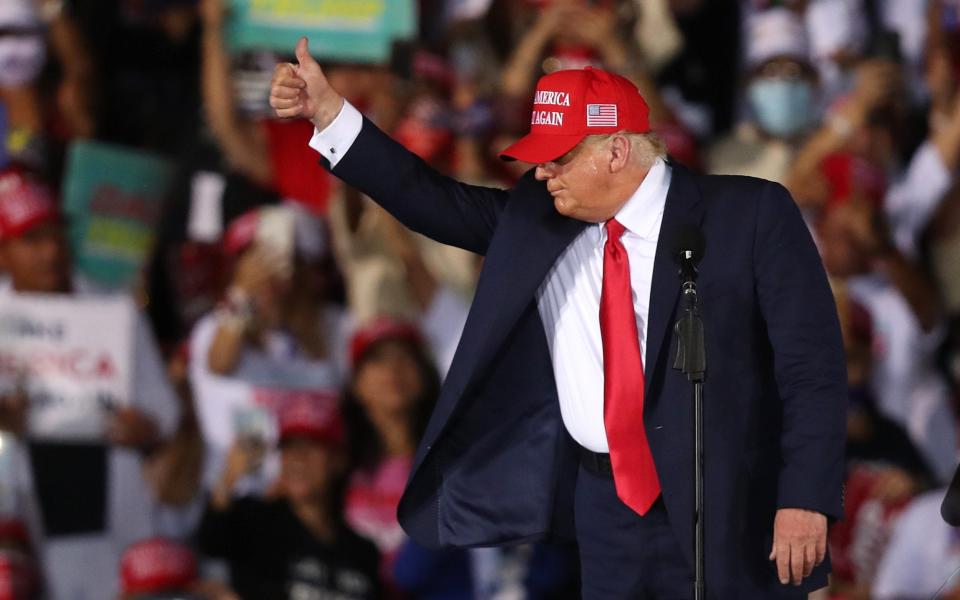 President Donald Trump makes a campaign stop at Miami-Opa Locka Executive Airport on November 1 - Joe Raedle/Getty