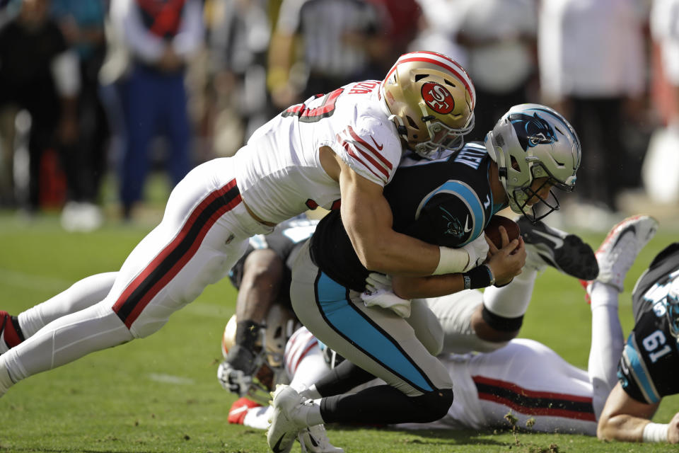 Carolina Panthers quarterback Kyle Allen is sacked by San Francisco 49ers defensive end Nick Bosa during the first half of an NFL football game in Santa Clara, Calif., Sunday, Oct. 27, 2019. (AP Photo/Ben Margot)