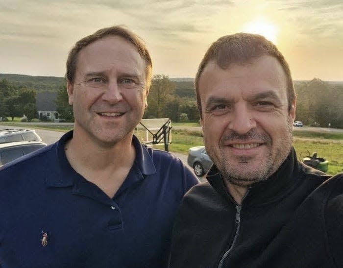 Adam Cote, left, of Sanford, Maine, and Ogy Nikolic, of Bosnia, have been friends ever since Cote and his mother, Kitty Ahlquist Chadbourne, helped Nikolic pursue an education in America more than 25 years ago.