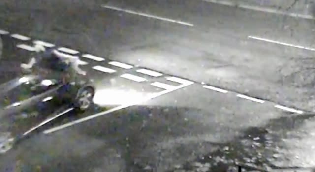 Moment motorist hits pedestrian and 'leaves him for dead'