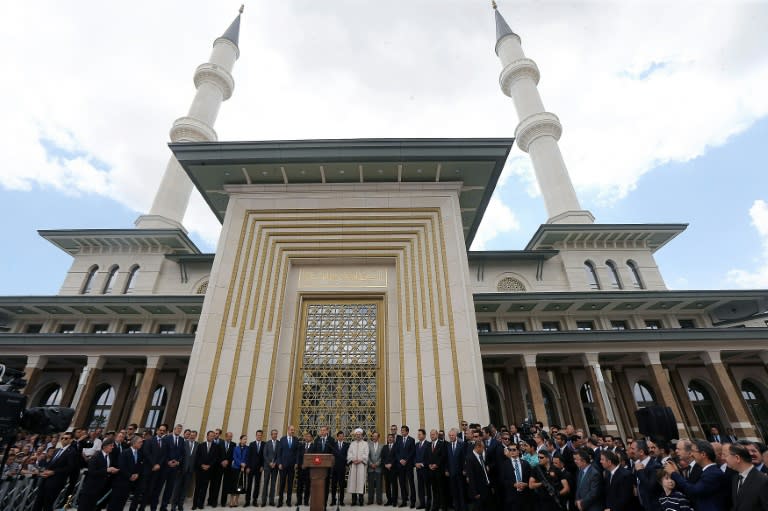 President Recep Tayyip Erdogan delivers a speech during the inauguration of the new Bestepe People's Mosque on the grounds of the Turkish presidential palace in Ankara, July 3, 2015