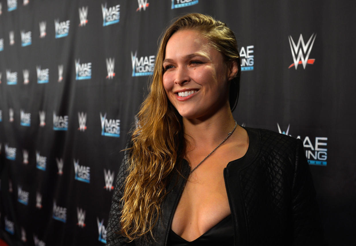 A Tuesday dinner with Triple H has people wondering about Ronda Rousey’s WWE plans. (Getty)