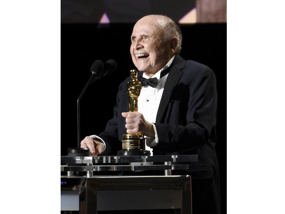 FILE - In this Saturday, Nov. 12, 2016 file photo, Honoree Lynn Stalmaster accepts his award at the 2016 Governors Awards at the Dolby Ballroom in Los Angeles. Lynn Stalmaster, the Oscar-winning casting director whose eye for talent helped launch the careers of John Travolta, Christopher Reeve, Richard Dreyfuss and many other actors, has died. He was 93.(Photo by Chris Pizzello /Invision/AP, File)