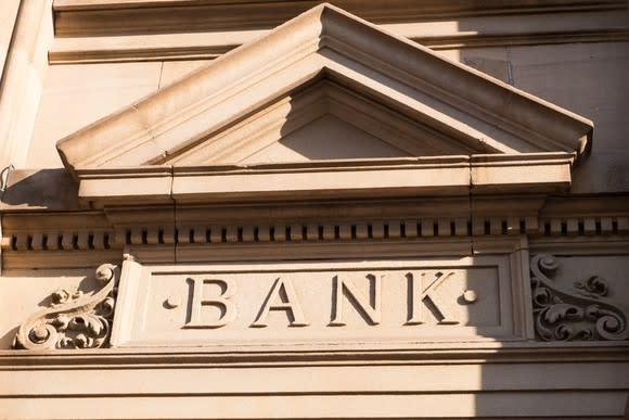 Bank written on stone building