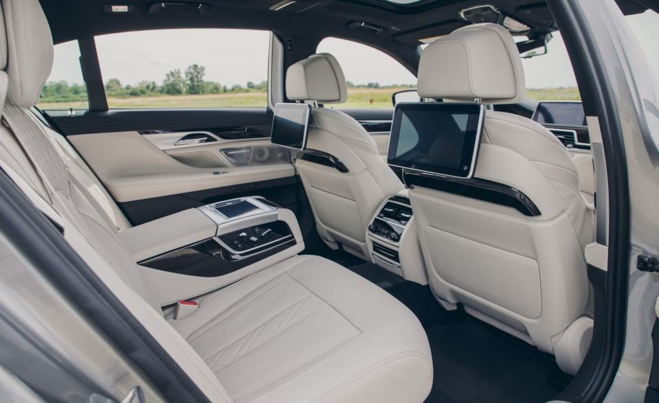 <p>Large screens behind both front seats provide rear-seat passengers with entertainment and control for the car's many functions, including the seats, windows, media, and climate.</p>