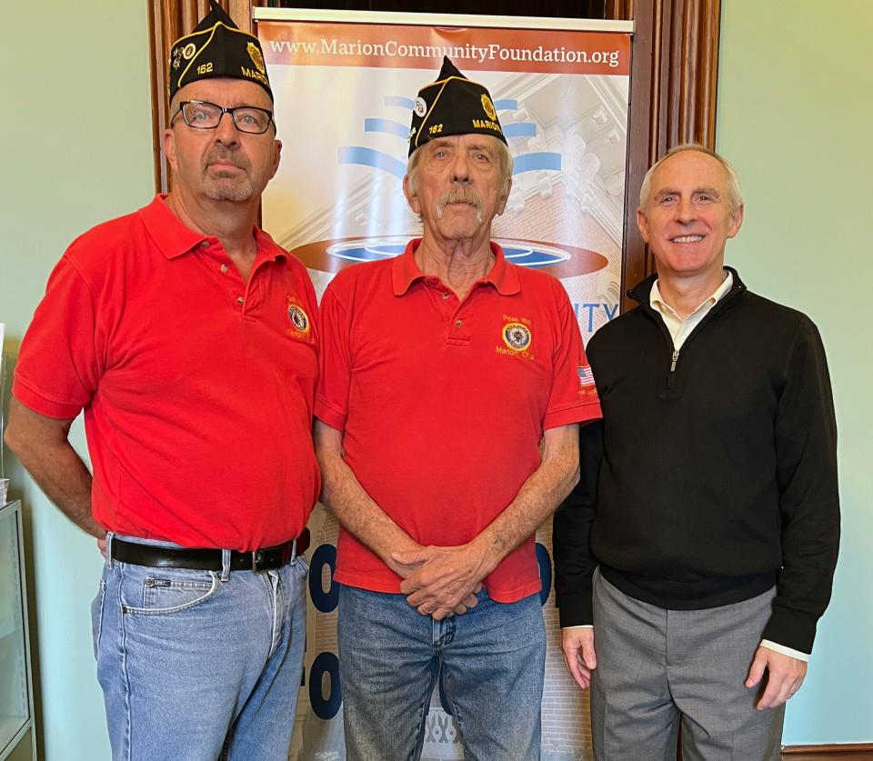 The Bird-McGinnis American Legion Post 162 is the first local veterans' organization to create a scholarship at Marion Community Foundation. It will award a $1,000 scholarship annually to a Marion student who is family of or active military or veteran. Left to right are: David Ross, Post financial officer, and John Jones, Post commander, with Marion Community Foundation President and CEO Dean Jacob.
