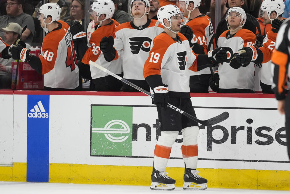 Philadelphia Flyers right wing Garnet Hathaway is congratulated for his goal against the Chicago Blackhawks during the second period of an NHL hockey game Wednesday, Feb. 21, 2024, in Chicago. (AP Photo/Erin Hooley)