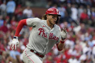 Philadelphia Phillies' Alec Bohm hits a double during the fifth inning in Game 1 of a National League wild card baseball playoff series against the St. Louis Cardinals, Friday, Oct. 7, 2022, in St. Louis. (AP Photo/Jeff Roberson)