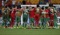 Iraq players celebrate their victory over Jordan after their Asian Cup Group D soccer match at the Brisbane Stadium in Brisbane January 12, 2015. REUTERS/Edgar Su