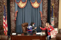 A protester sits in the Senate Chamber on January 06, 2021 in Washington, DC.(Photo by Win McNamee/Getty Images)