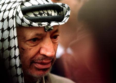 PLO chairman Yasser Arafat listens to journalists at the National Assembly after a meeting with Speaker Laurent Fabius. PW/JDP