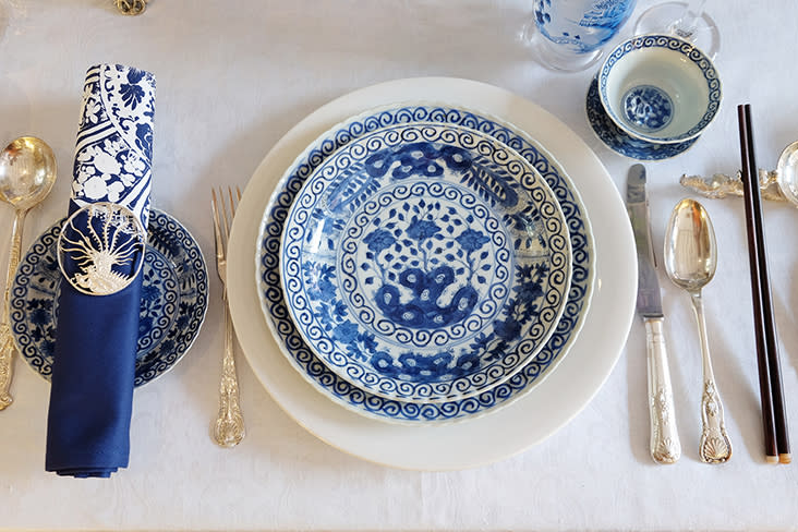 The 19th century Kangxi-style dinner service as part of a modern table setting.