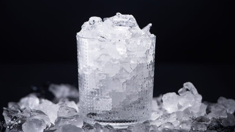 a glass filled with crushed ice