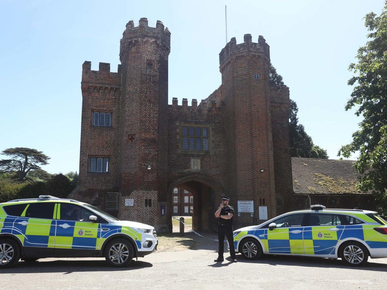 Police presence at the entrance to Lullingstone Castle in Eynsford, Kent, where a man has died after reports of a disturbance in the grounds: PA