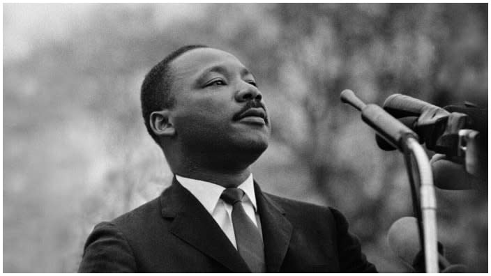 Dr. Martin Luther King, Jr. speaking before crowd of 25,000 Selma To Montgomery, Alabama civil rights marchers, in front of Montgomery, Alabama state capital building. On March 25, 1965 in Montgomery, Alabama. (Photo by Stephen F. Somerstein/Getty Images)