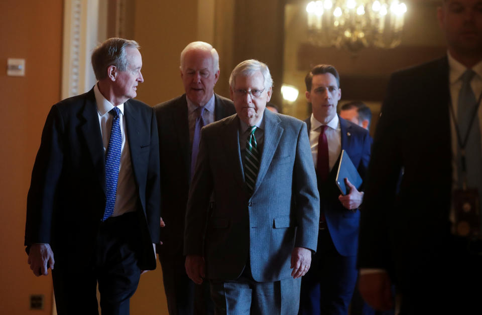 Senate Majority Leader Mitch McConnell and other Republican senators before the procedural start of the impeachment trial of U.S. President Donald Trump. (Photo: Jonathan Ernst / Reuters)