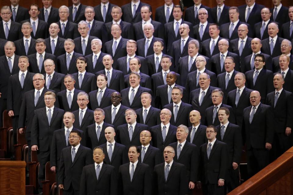 Members of the Mormon Tabernacle Choir sing during the opening session of the two-day Mormon church conference Saturday, April 5, 2014, in Salt Lake City. More than 100,000 Latter-day Saints are expected in Salt Lake City this weekend for the church's biannual general conference. Leaders of The Church of Jesus Christ of Latter-day Saints give carefully crafted speeches aimed at providing members with guidance and inspiration in five sessions that span Saturday and Sunday. They also make announcements about church statistics, new temples or initiatives. In addition to those filling up the 21,000-seat conference center during the sessions, thousands more listen or watch around the world in 95 languages on television, radio, satellite and Internet broadcasts. (AP Photo/Rick Bowmer)