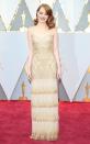 <p>Emma Stone wore a Ombré gown drenched in Swarovski crystals designed by Givenchy.</p>